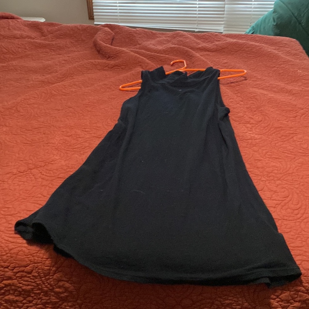 Sleeveless black mock neck knit dress